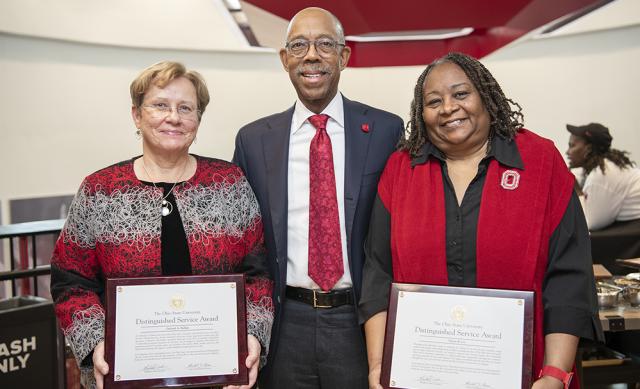 Image of Dr. Drake, President of The Ohio State University presenting Distinguished Service Awards